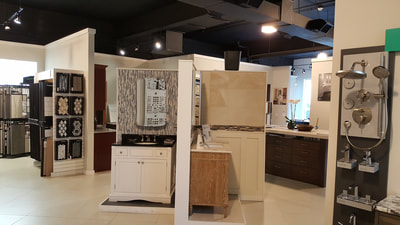 Bathroom fixtures and storage selections at Broadway Kitchens & Baths showroom