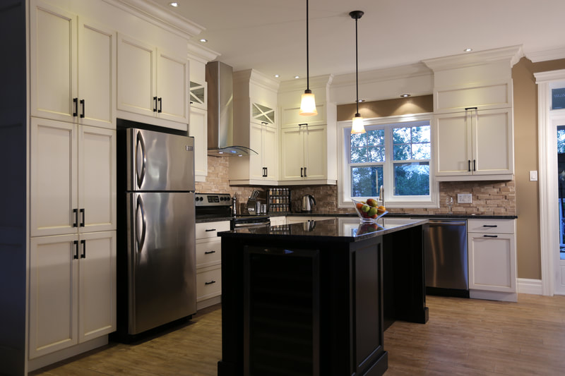 Black and white kitchen with work island