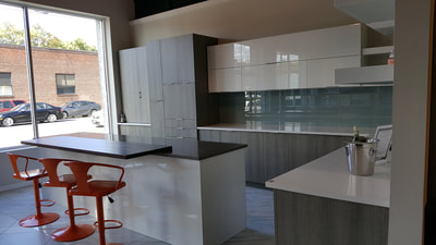 Contemporary kitchen remodeling display at Broadway Kitchens & Baths showroom