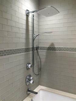 Tiled shower with decorative inlay
