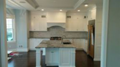 White kitchen with tiled backsplash