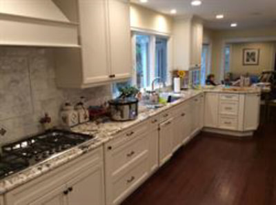 White kitchen with L-shaped countertop