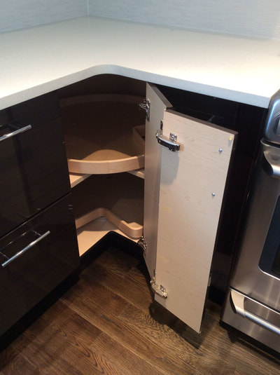 Kitchen remodeling project, closeup of Lazy Susan corner cabinet storage